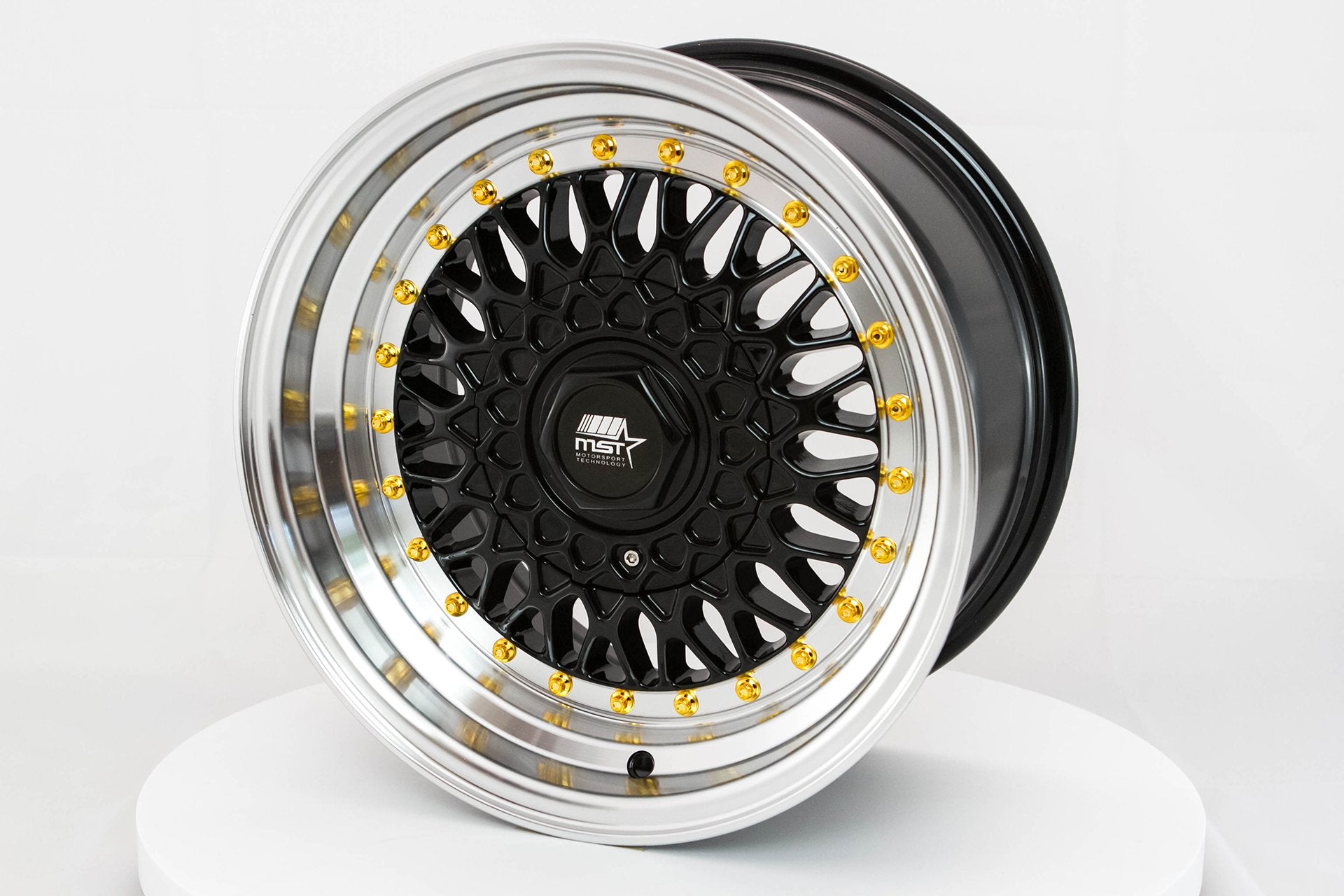 Stunning MST MT13 Wheels - 15x8.0, 4x100/4x108 ET20, 73.1 with Black Finish and Machined Lip Gold Rivets